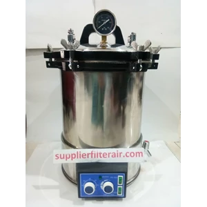 Autoclave plus timer untuk mensterilkan peralatan